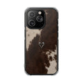 A phone case featuring a brown and cream cowhide pattern with a small silver deer head logo in the center, shown on a black smartphone against a plain white background.