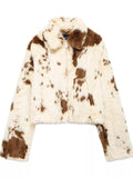 Faux fur jacket with brown and white cow print pattern on a white background