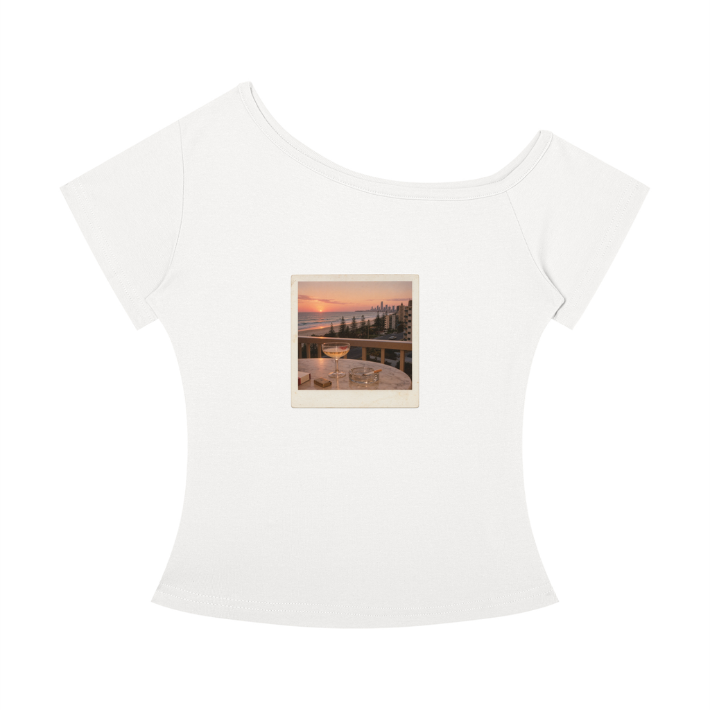 A white short-sleeve scoop-neck t-shirt featuring a square graphic print on the chest depicting a scenic sunset landscape with mountains and a lake.