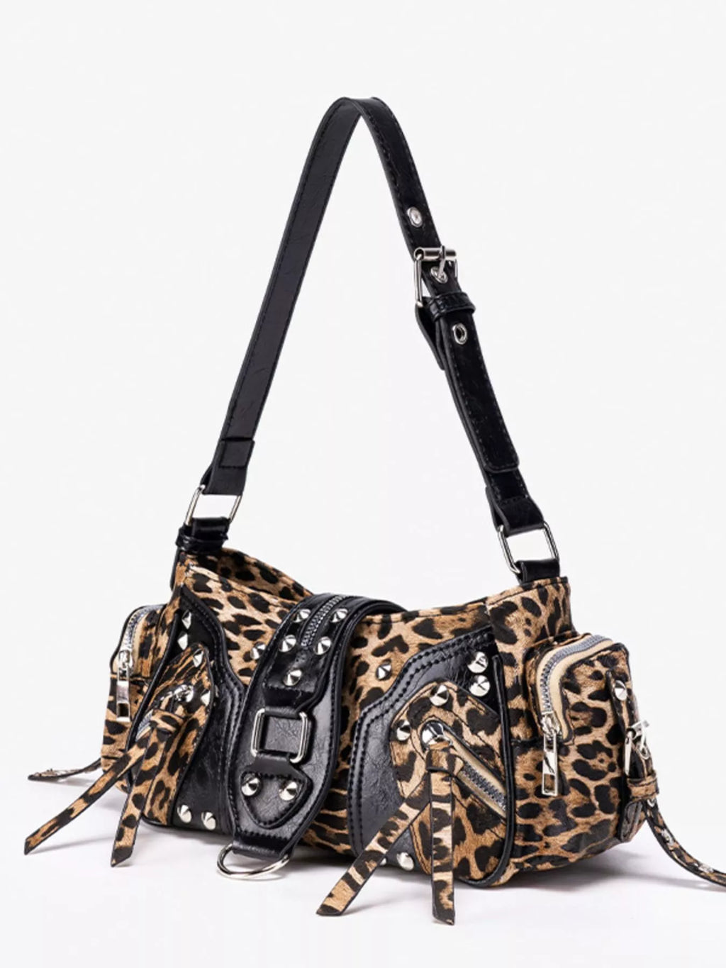 A studded leopard-print shoulder bag with black faux-leather trim, a long black shoulder strap, and silver-tone hardware, shown on a plain white background.